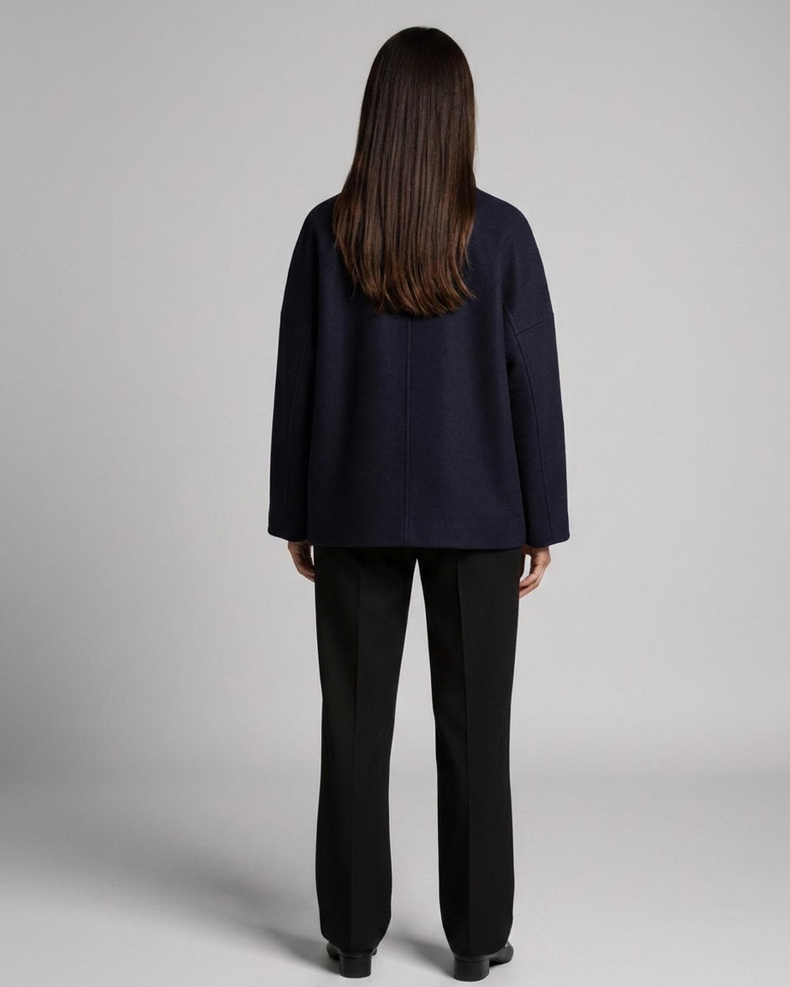 Aleida navy double-breasted wool coat — model back view (AI visualisation)