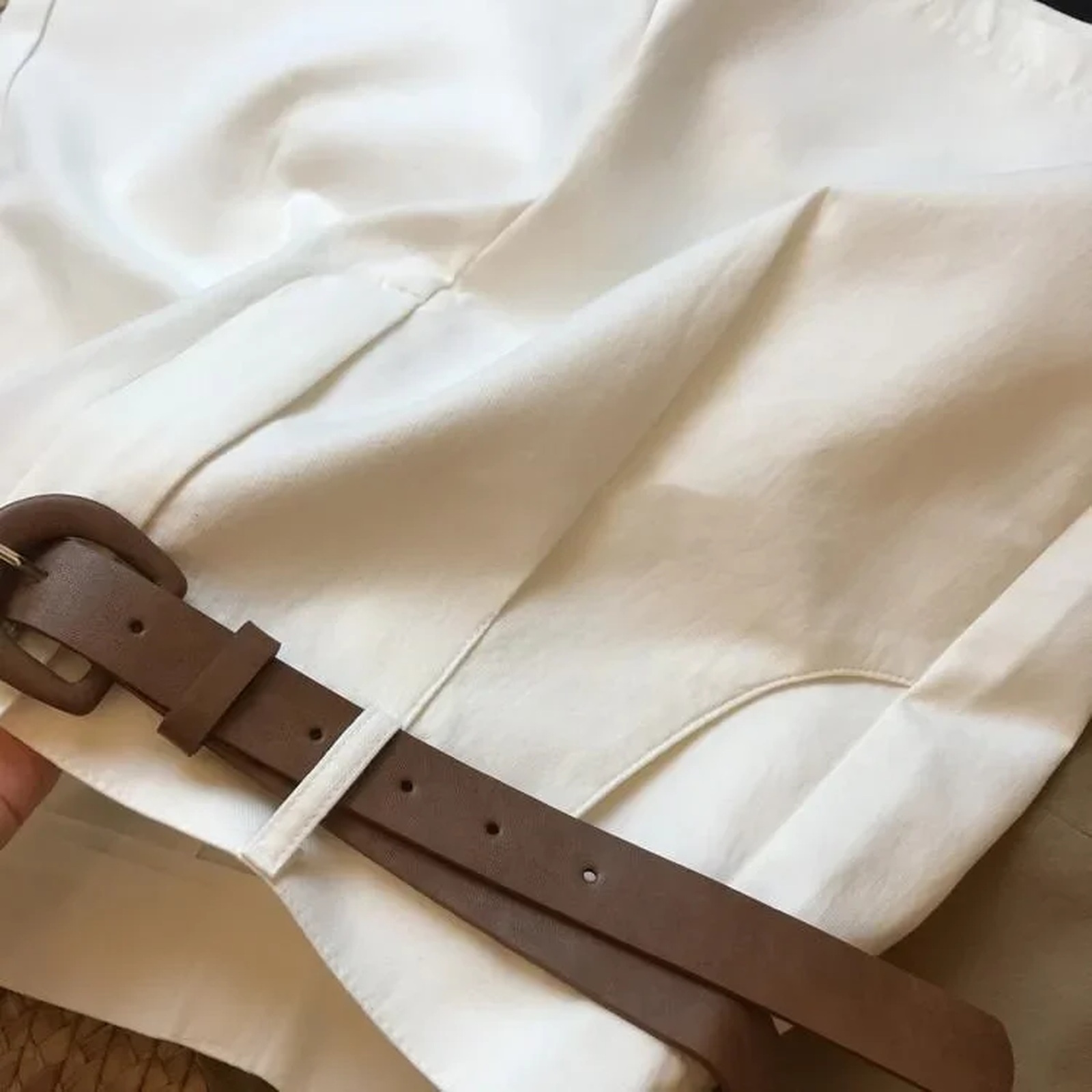 Antje · Belted A-line shorts — fabric detail