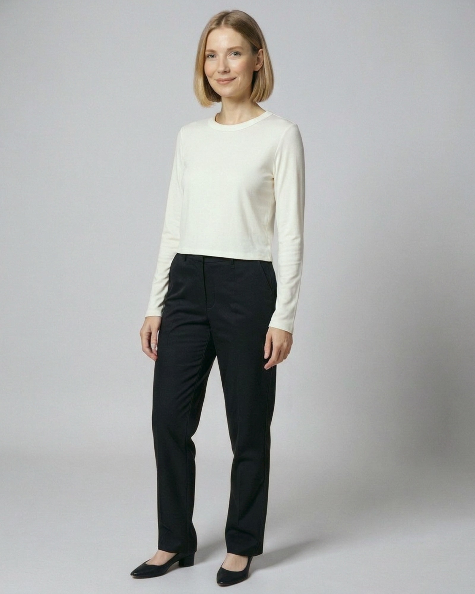 Astrid · Brushed crew-neck long-sleeve tee — on model, front (AI visualisation)