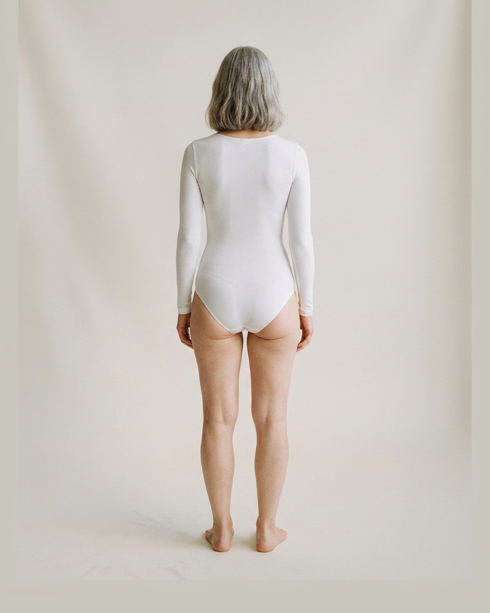 Berta · Long-sleeve shaping bodysuit — worn on model, back view (AI visualisation)