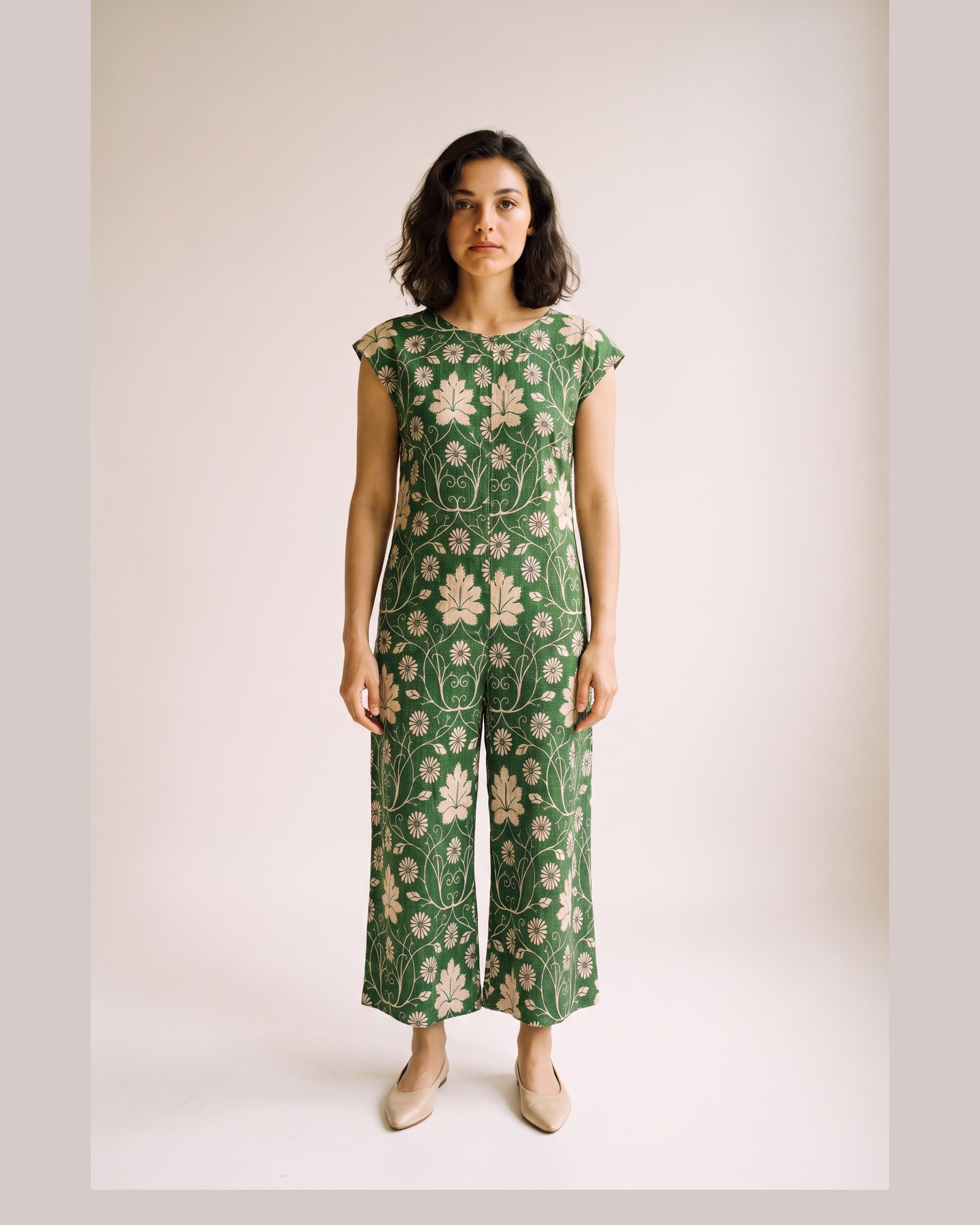 Francien Printed Cap Sleeve Jumpsuit — Dark Green, on model (AI visualisation)