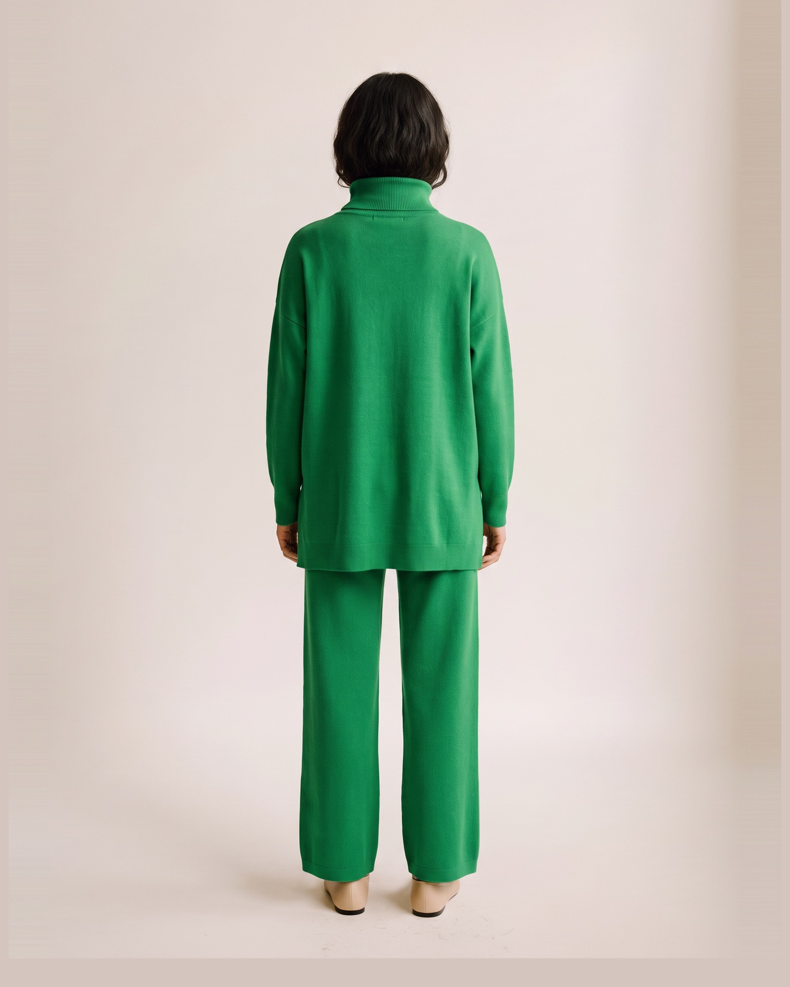 Godelieve knit sweater and trouser set — on model, back (AI visualisation)