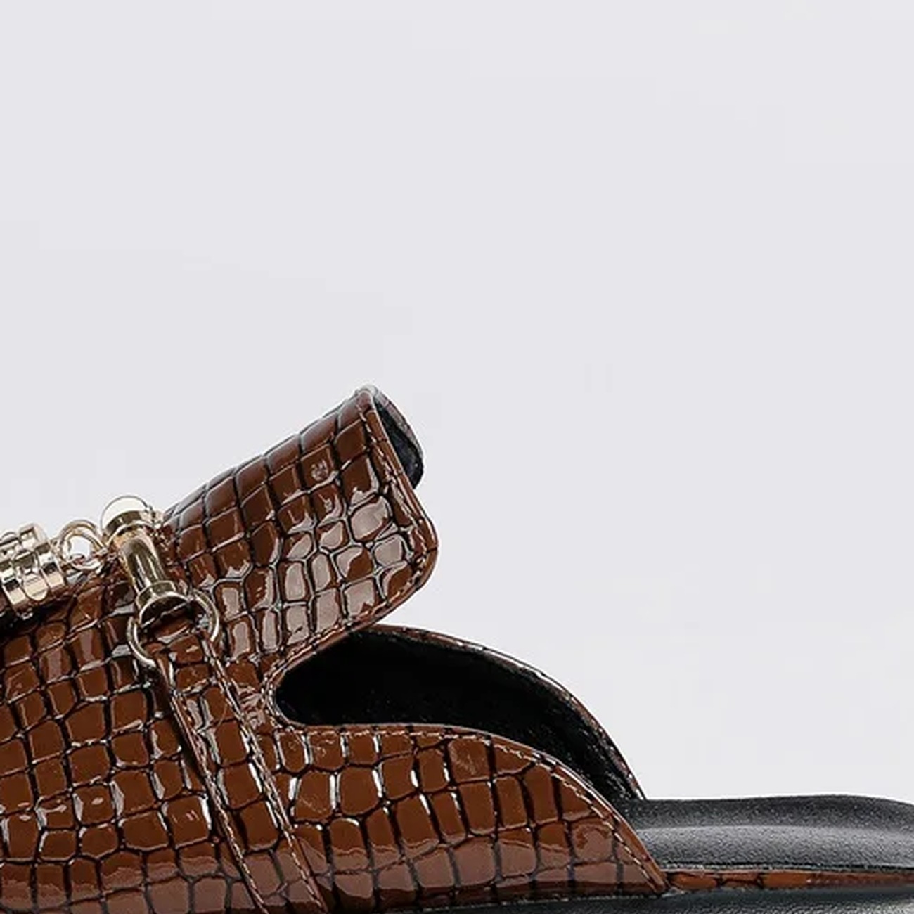 Griselda · Croc-effect tassel loafer mule — fabric detail