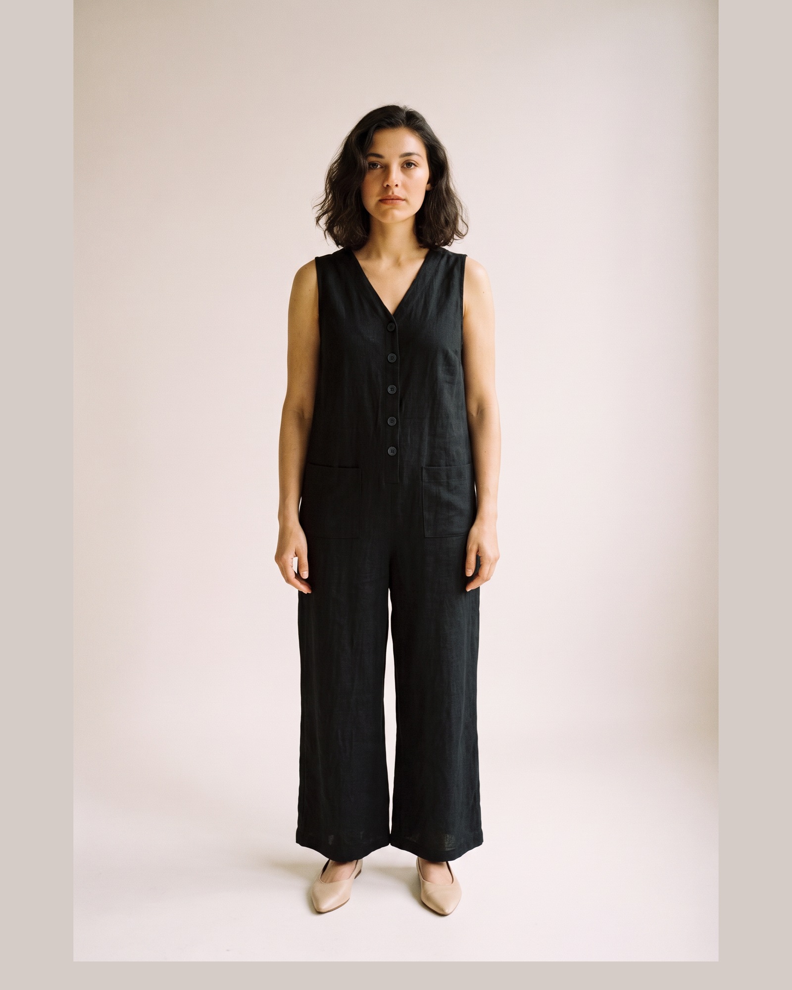 Heleen Buttoned Wide Leg Jumpsuit — black, on model (AI visualisation)