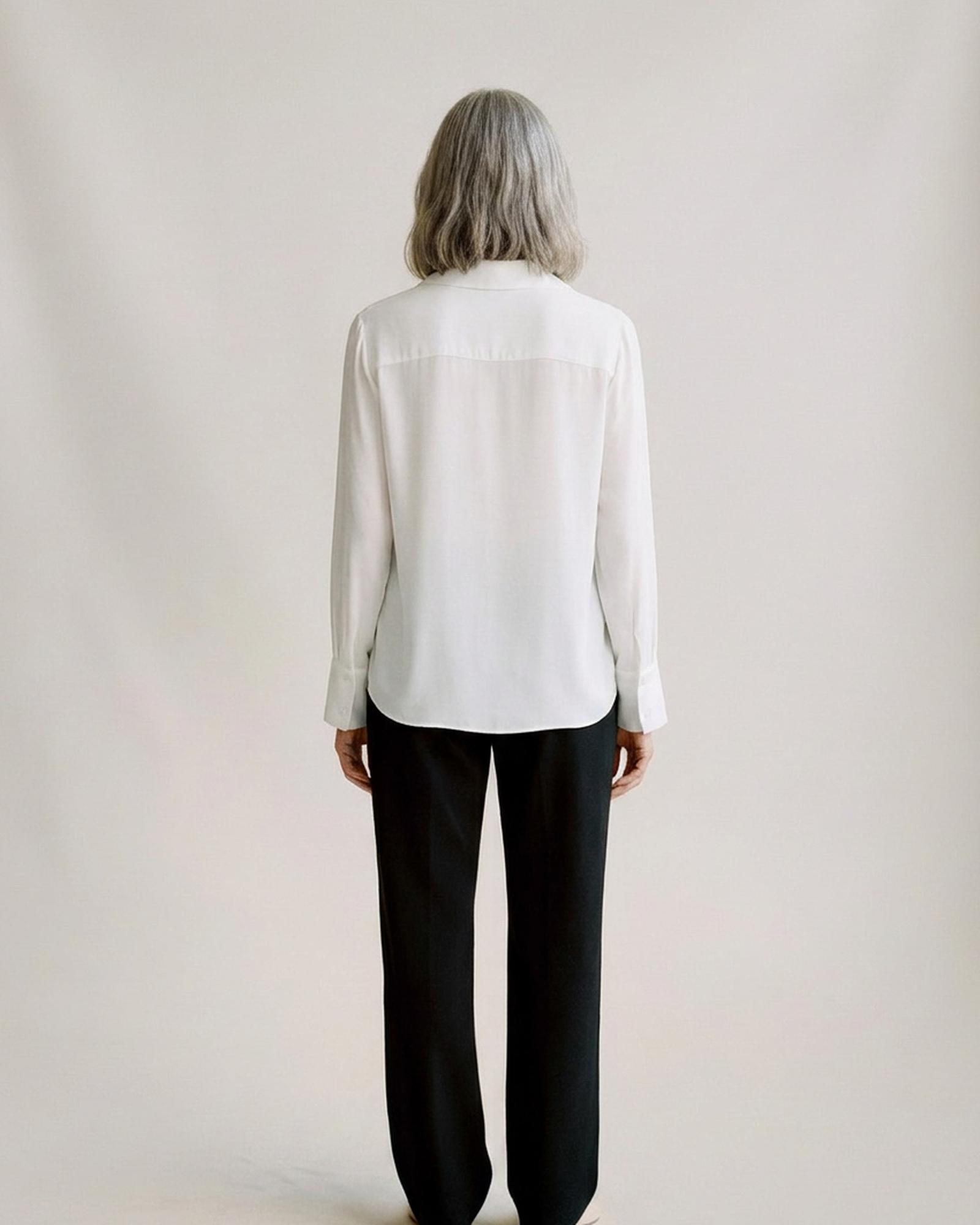 Hilde · Lace-panel white blouse — on model, back (AI visualisation)