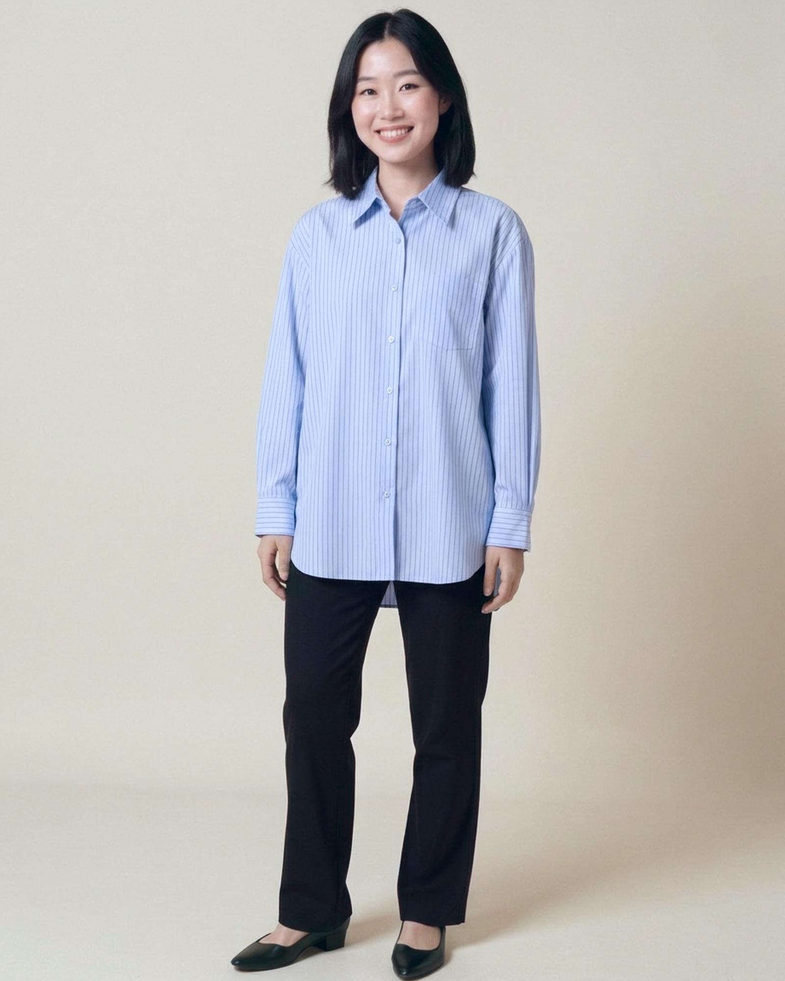 Ineke · Striped shirt blouse — on model, front (AI visualisation)