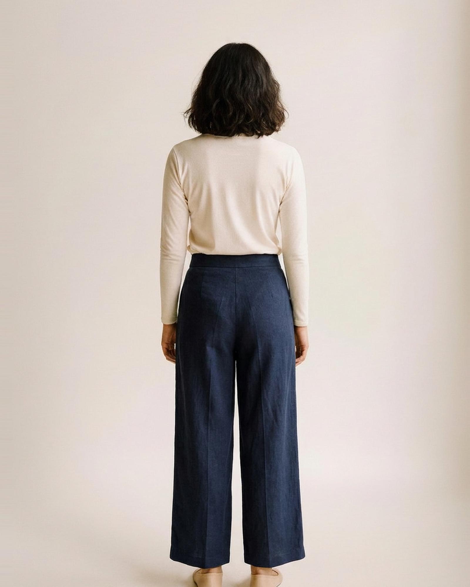 Jasmijn navy blue linen wide-leg trousers — model back view (AI visualisation)