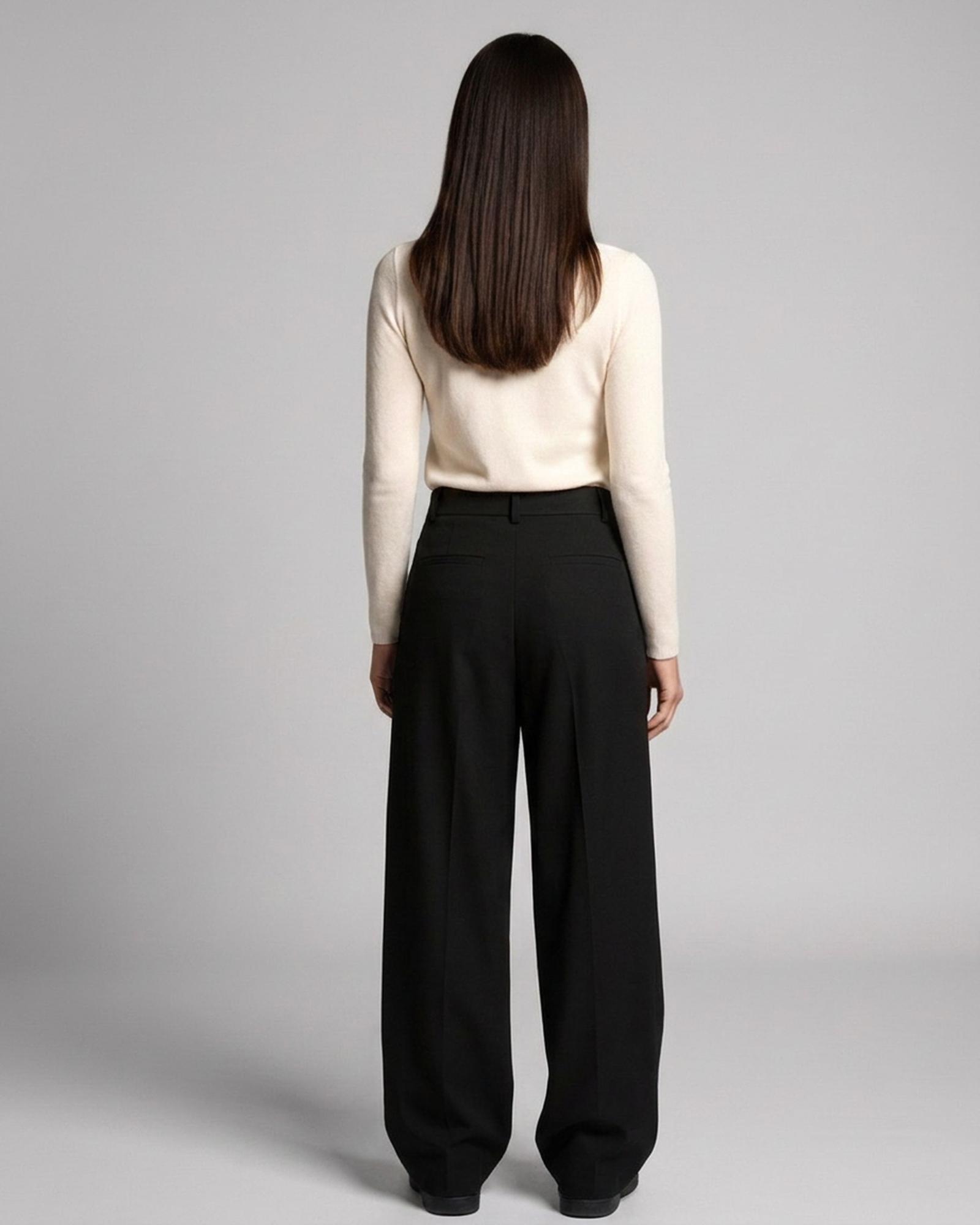 Maartje charcoal pleated wide-leg trousers — model back view (AI visualisation)