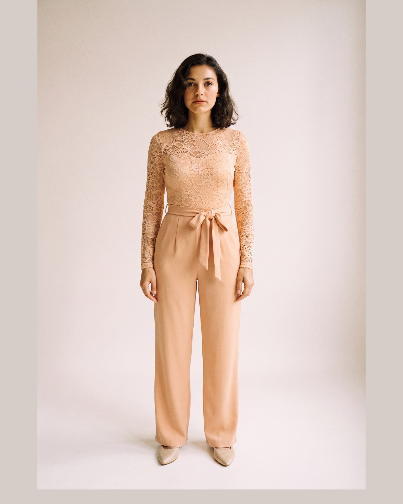 Marianne Lace Panel Belted Jumpsuit — Apricot, on model (AI visualisation)