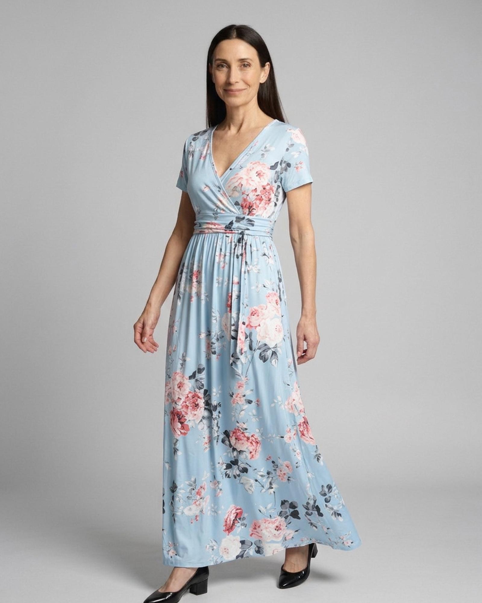 Marijke floral print wrap maxi dress in sky blue, worn by model (AI visualisation)
