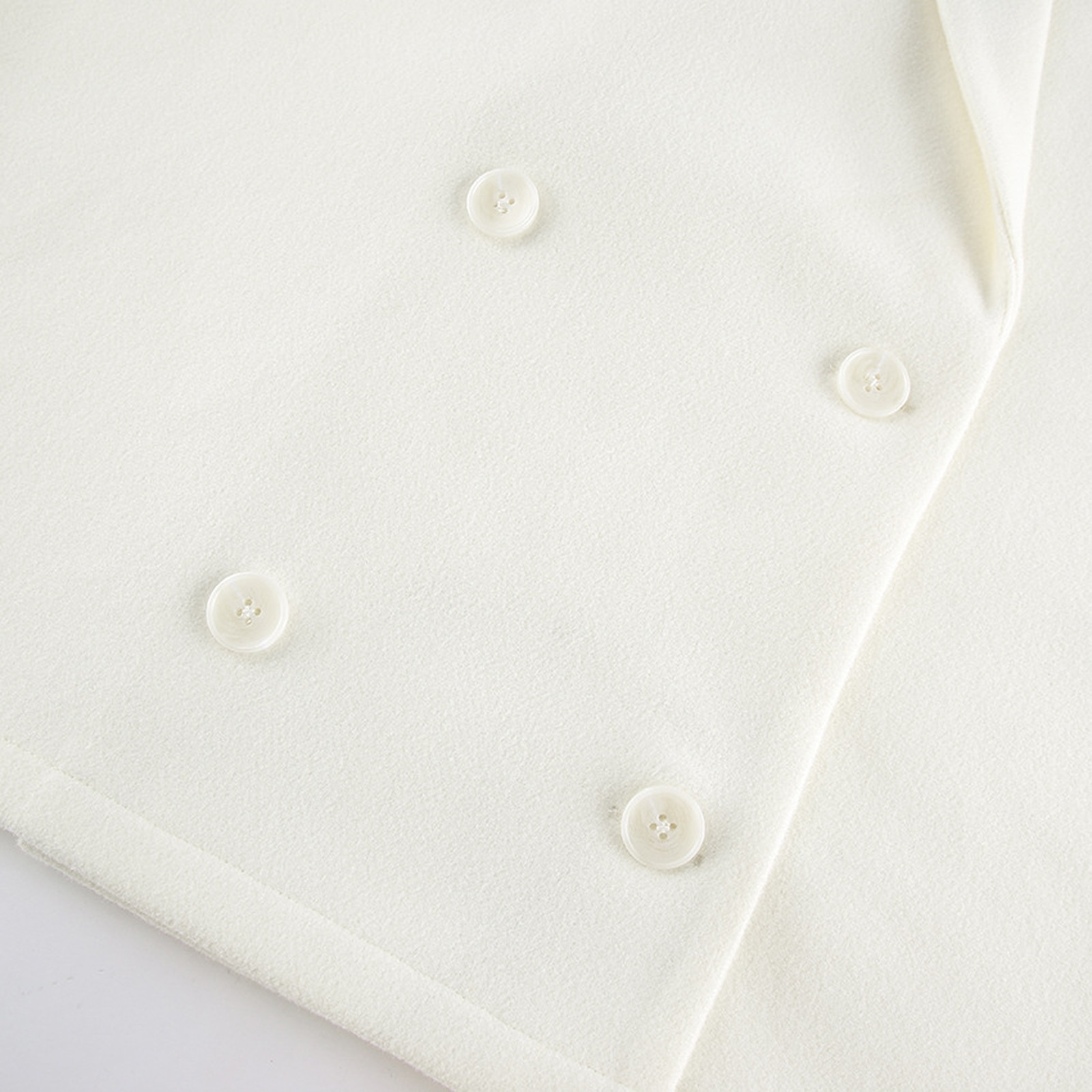 Marleen ivory wool notch-lapel blazer — double-breasted pearl buttons and wool texture detail, product photo