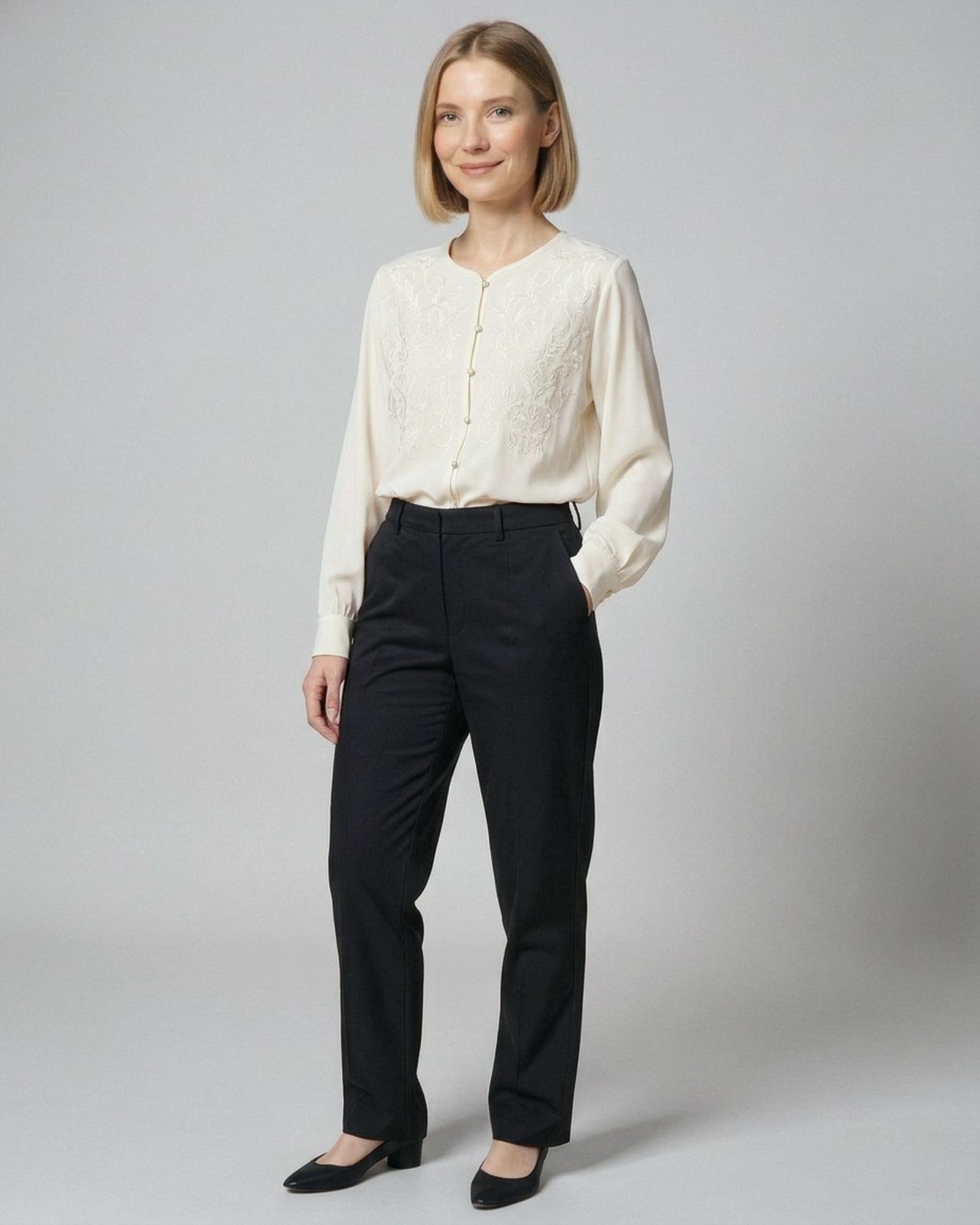 Meike · Embroidered chiffon blouse — on model, front (AI visualisation)