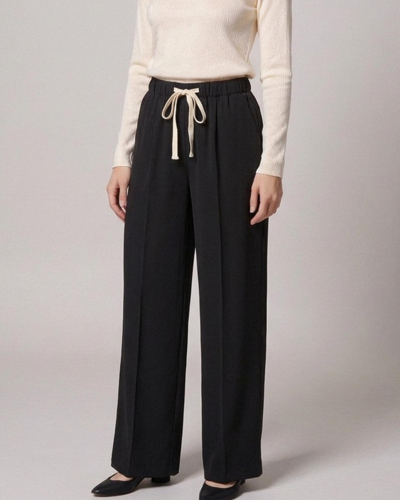 Noortje · Drawstring wide-leg trousers — on the model, front (AI visualisation)