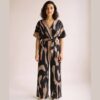 Petra Printed Batwing Wide Leg Jumpsuit — Taupe, on model (AI visualisation)