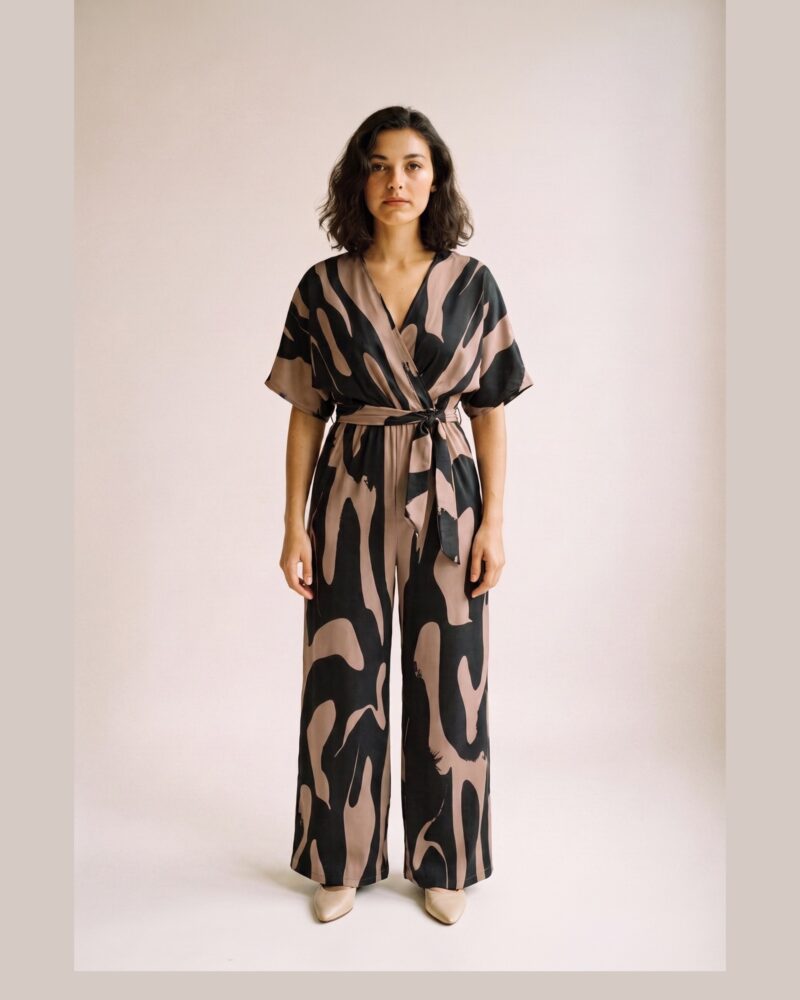 Petra Printed Batwing Wide Leg Jumpsuit — Taupe, on model (AI visualisation)