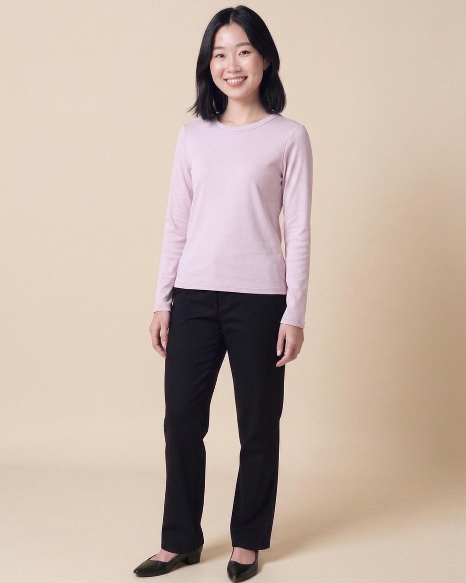 Saskia · Combed-cotton round-neck long-sleeve — on model, front (AI visualisation)