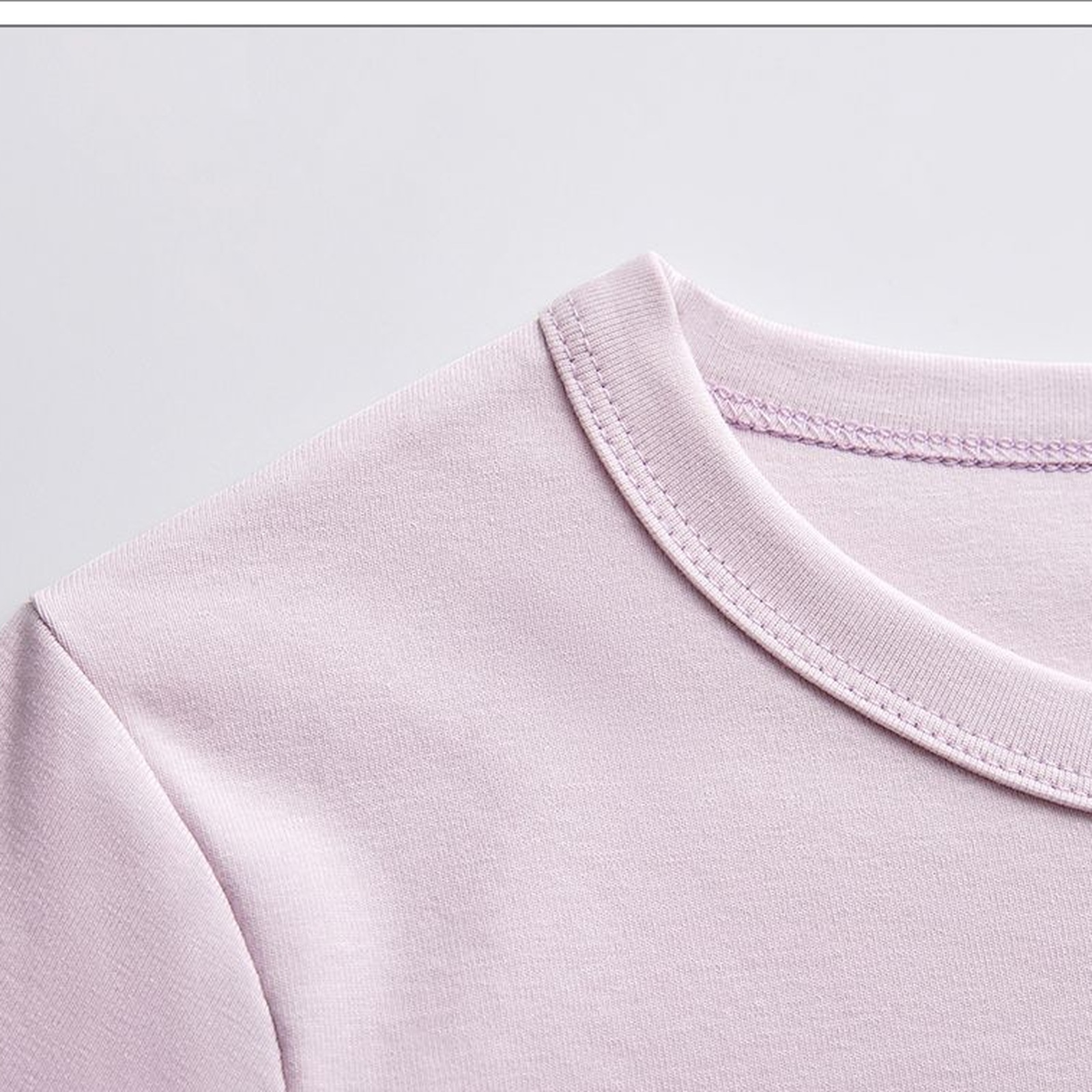 Saskia · Combed-cotton round-neck long-sleeve — fabric detail