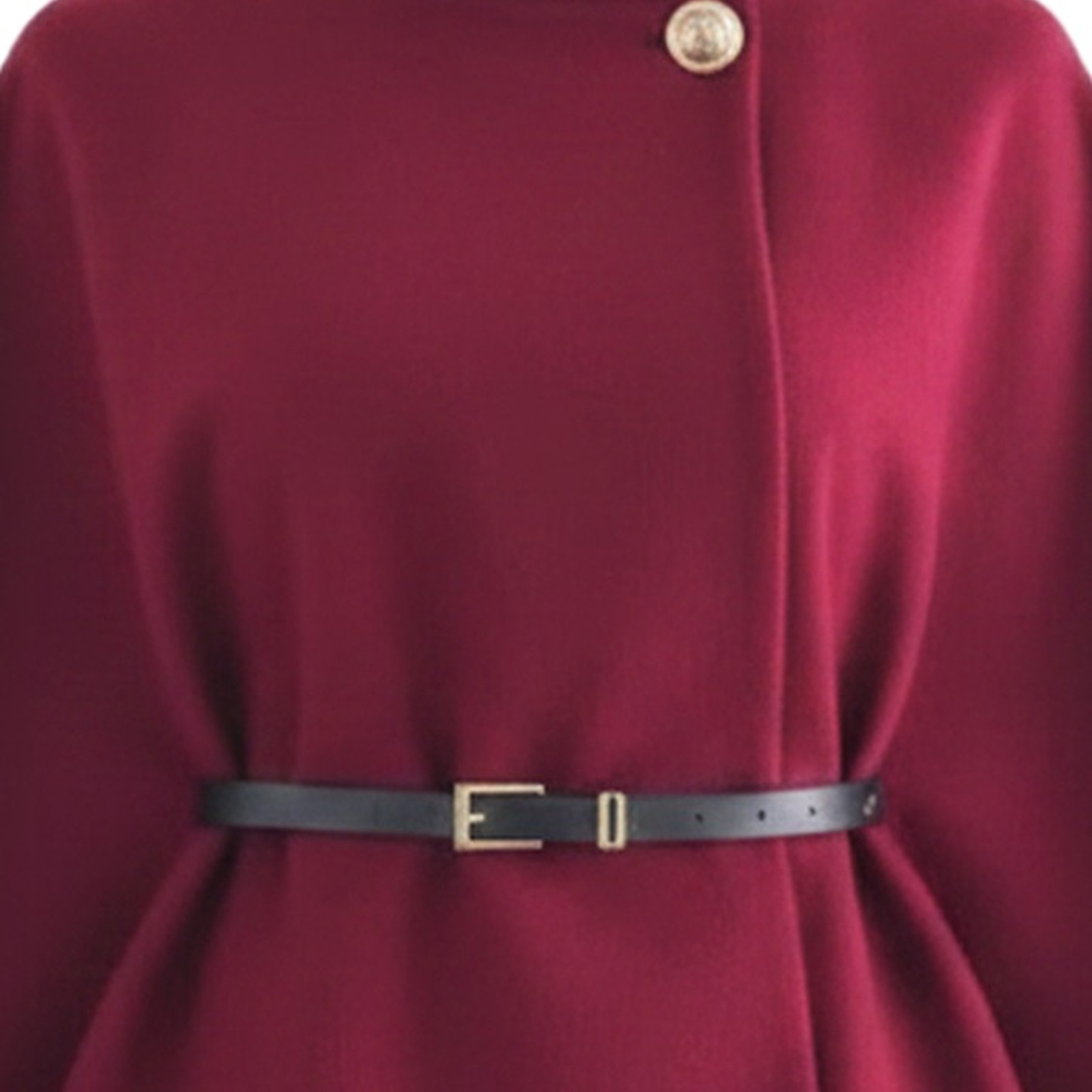 Sytske burgundy belted cape coat — fabric and closure detail (AI visualisation)