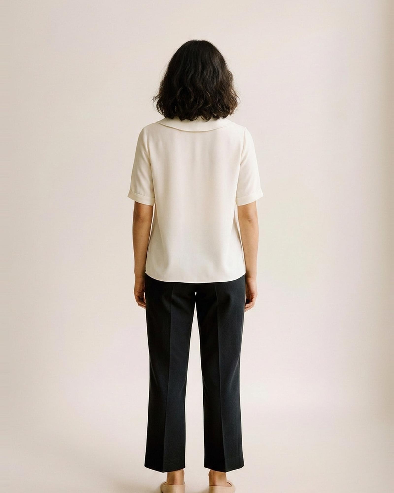 Tineke · Peter Pan collar chiffon blouse — on model, back (AI visualisation)