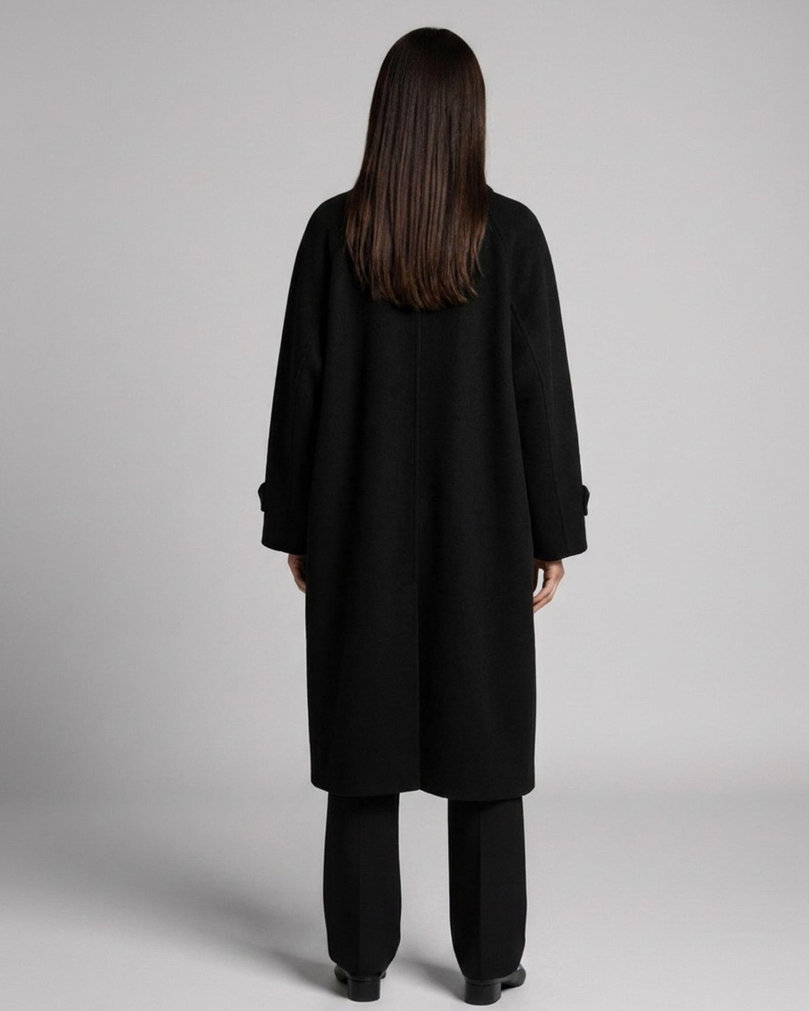 Willemke black long wool coat — model back view (AI visualisation)