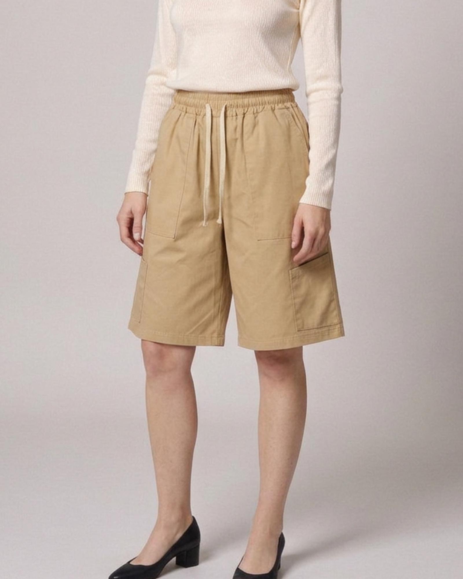Wobke · Utility wide-leg shorts — on model, front (AI visualisation)