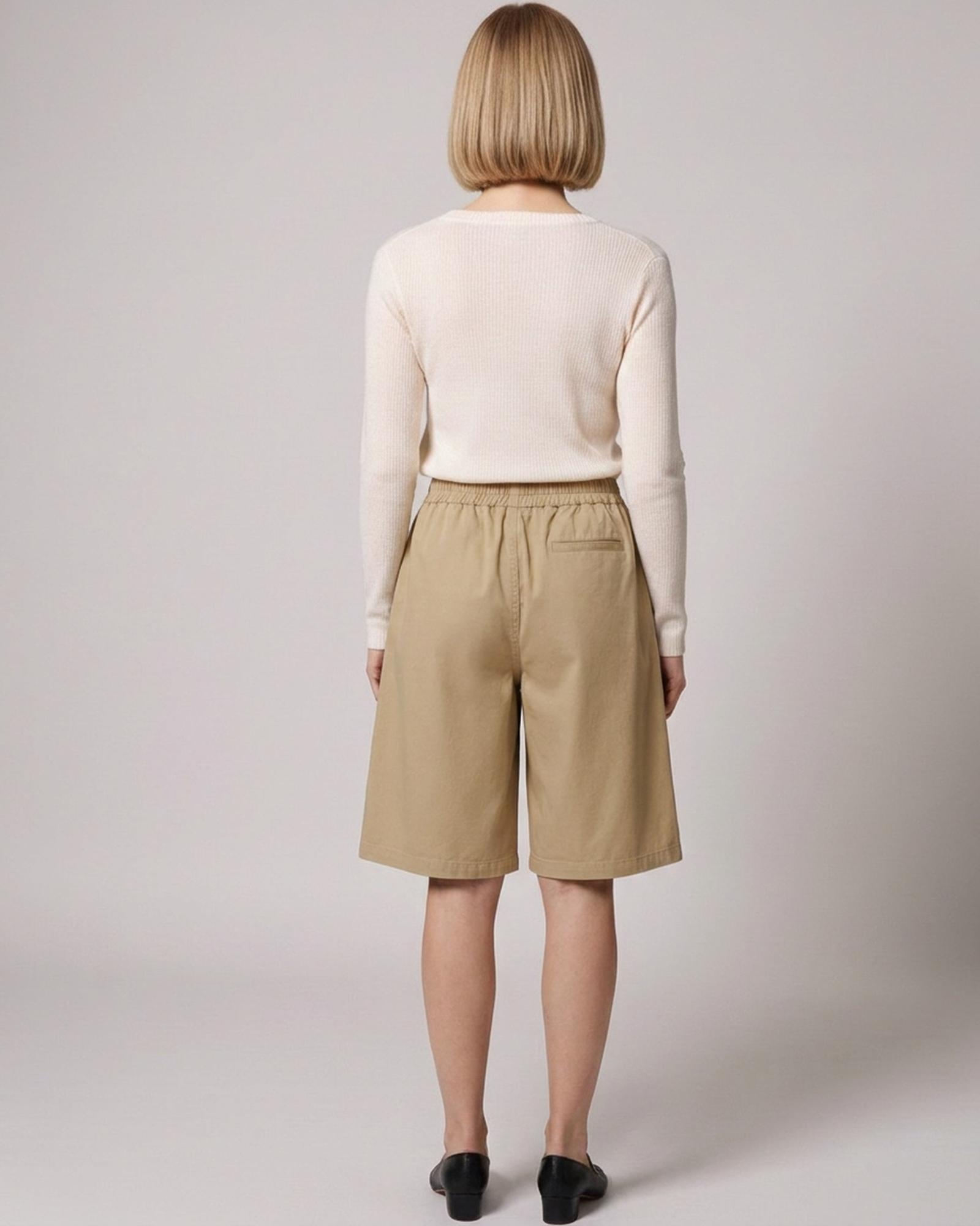 Wobke · Utility wide-leg shorts — on model, back (AI visualisation)