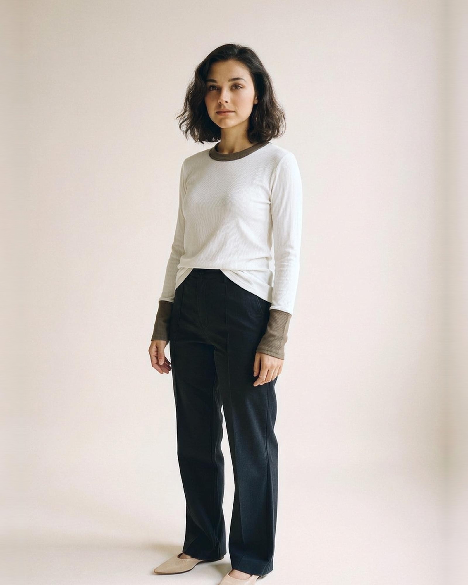 Carolien · Colour-block long-sleeve cotton tee — on model, three-quarter (AI visualisation)