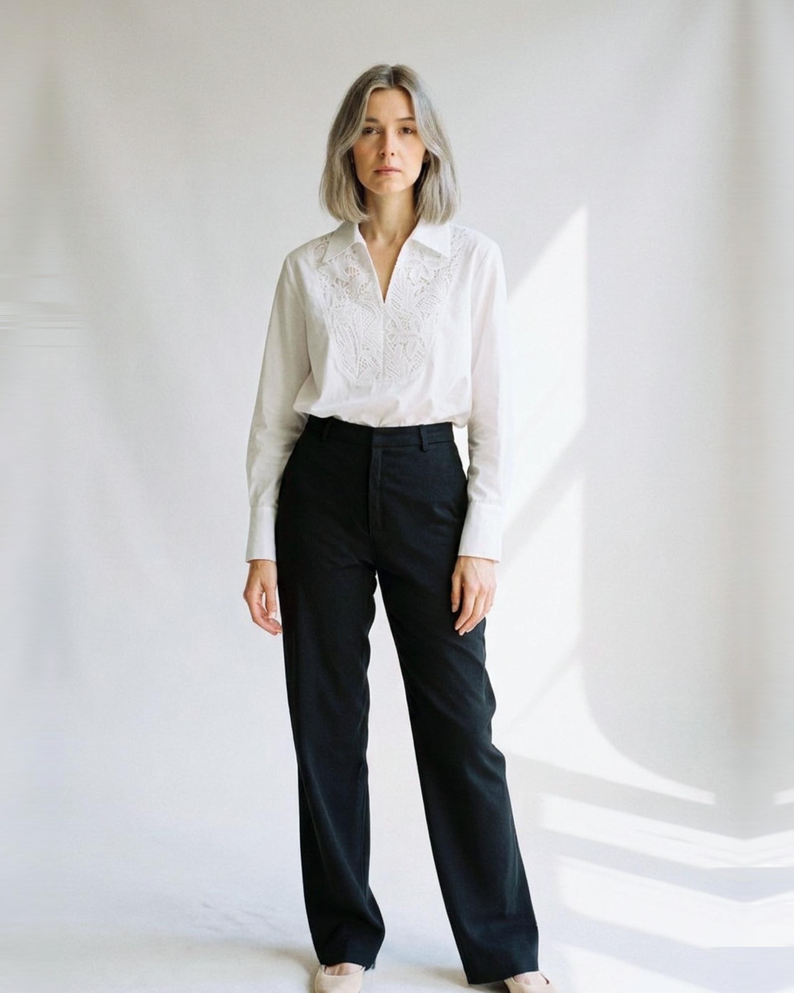 Hilde · Lace-panel white blouse — on model, front (AI visualisation)