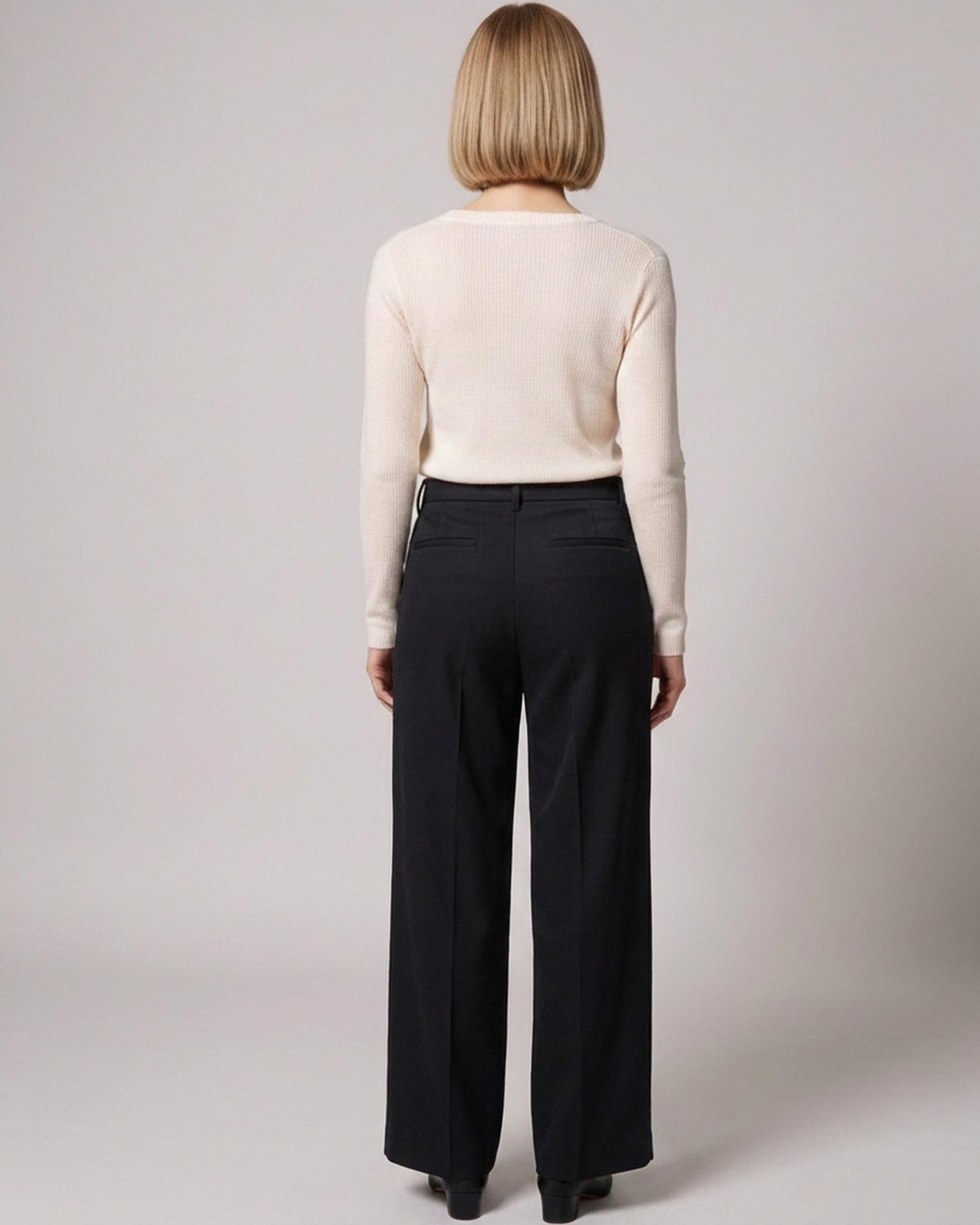 Draped high-waist trousers — back view on model (AI visualisation)