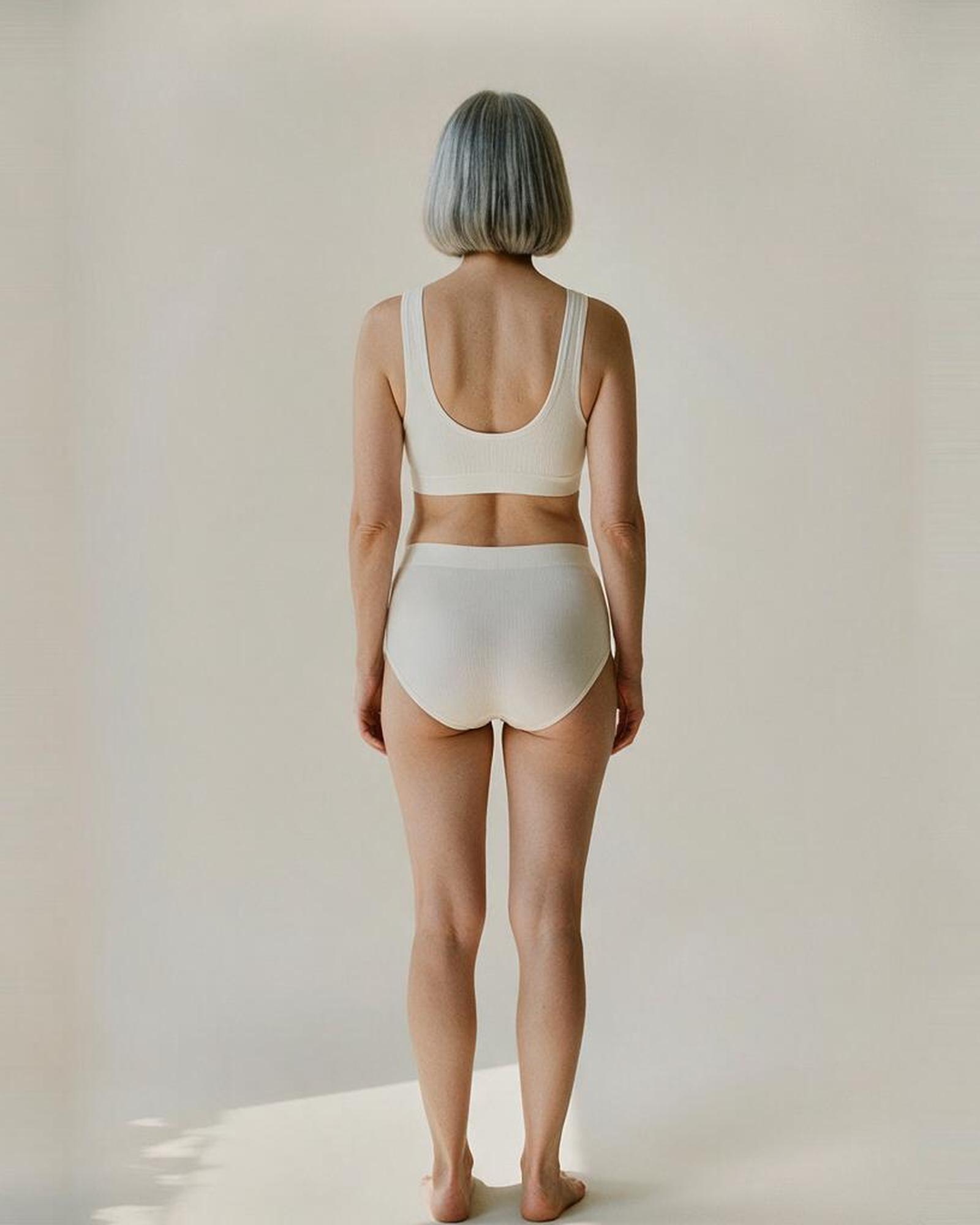 Seamless bralette and brief set — back view on model (AI visualisation)