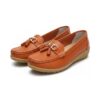 Cootje leather tassel moccasin in Orange — product pair packshot (AI visualisation)