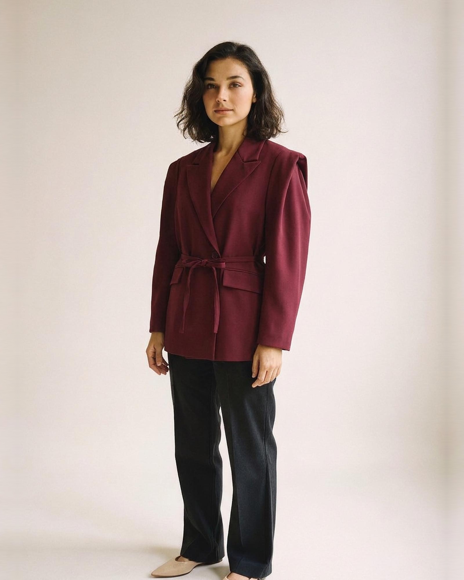 Sonja padded-shoulder blazer, wine red — three-quarter view (AI visualisation)