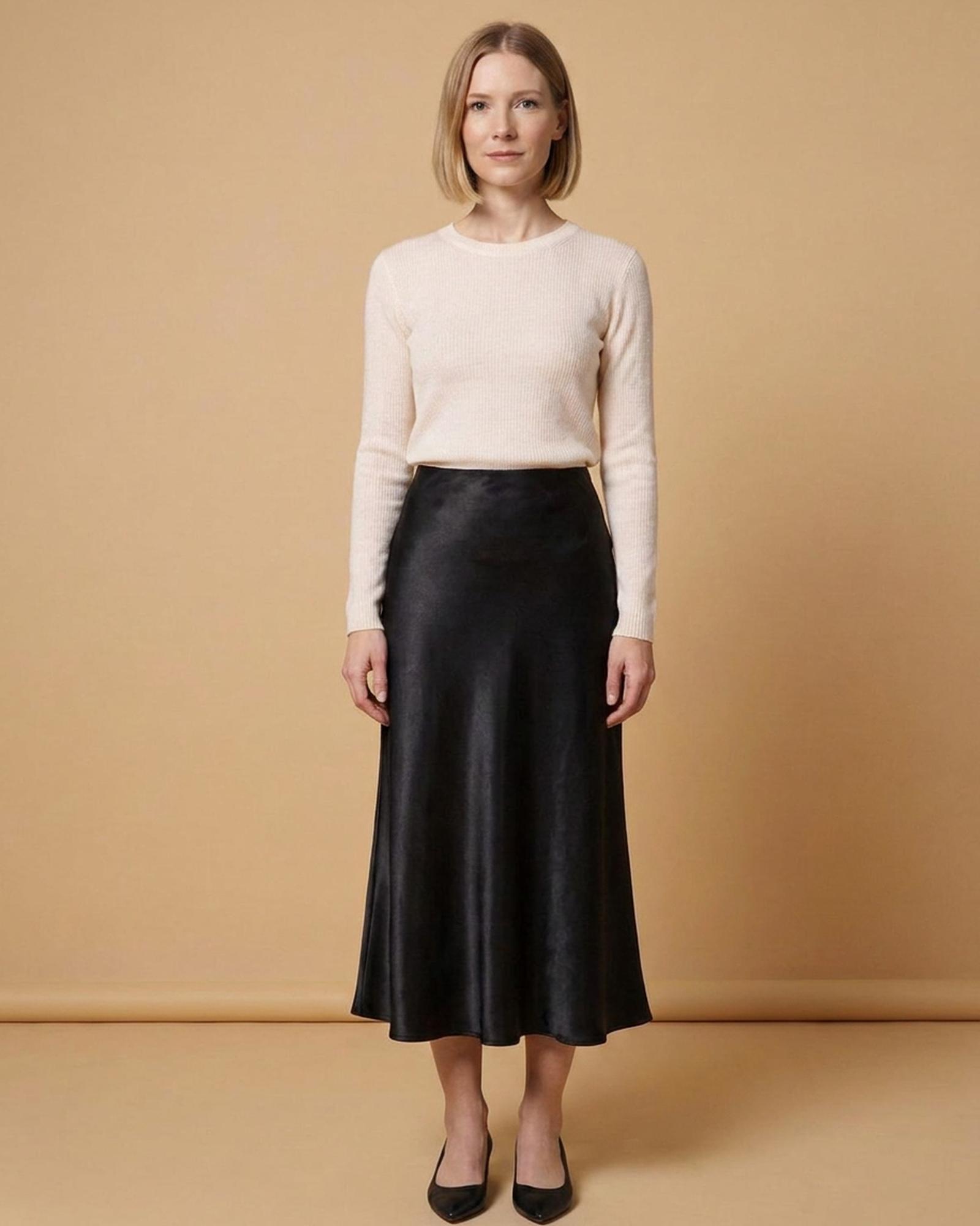 Black satin midi skirt — three-quarter view on model (AI visualisation)