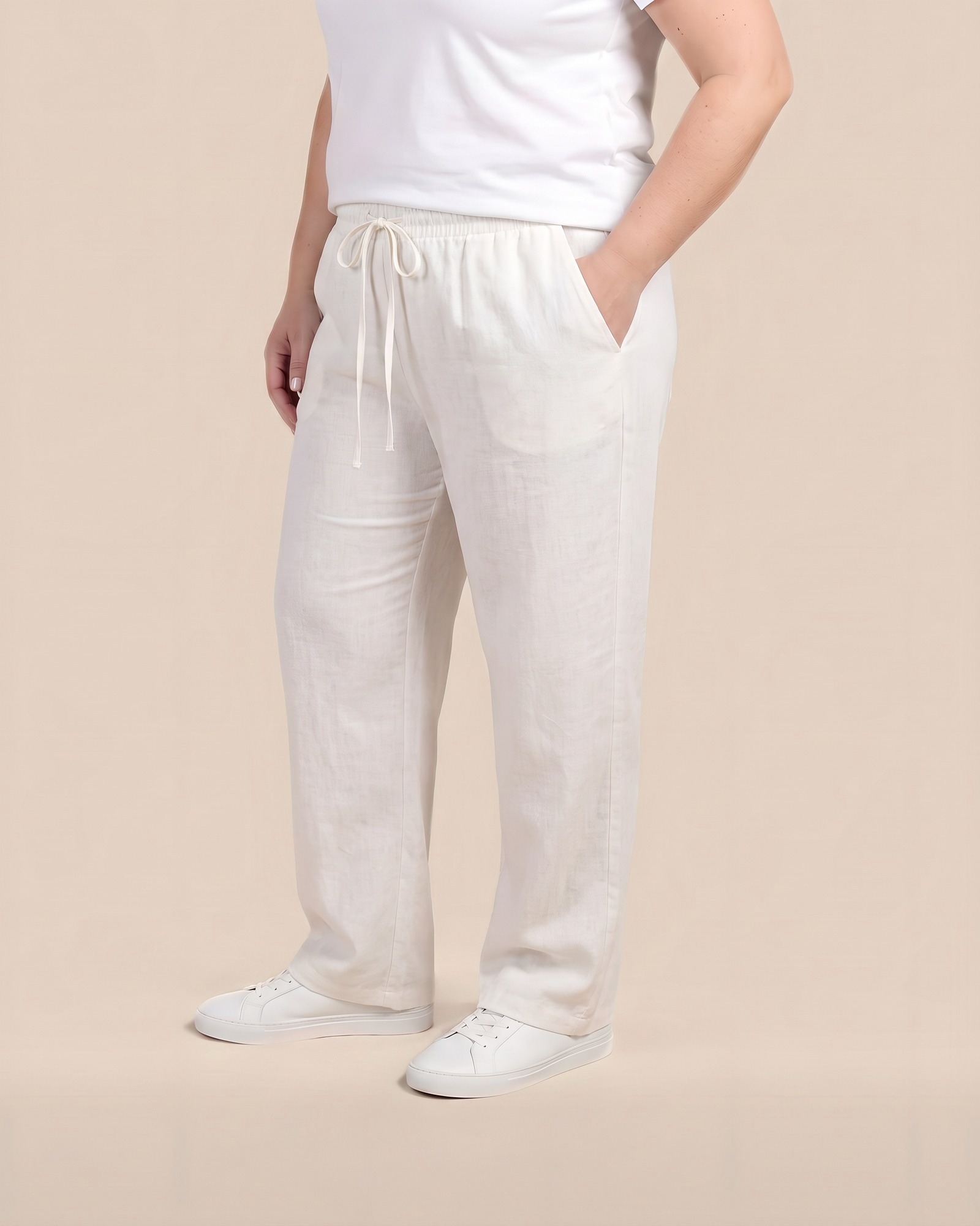 Janneke · Loose wide-leg trousers in White — worn on model, front